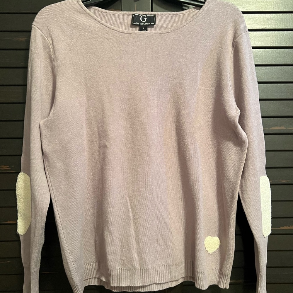 New without tags. The color is a pretty very very light purple